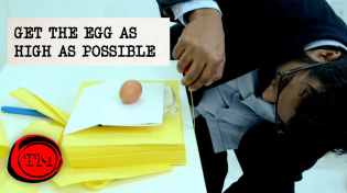 Thumbnail for Get The Egg As High As Possible Without Breaking It | Full Task | Taskmaster | Taskmaster
