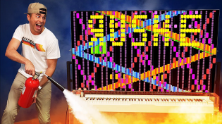 Thumbnail for Robot Piano Catches Fire Playing Rush E (World’s Hardest Song) | Mark Rober